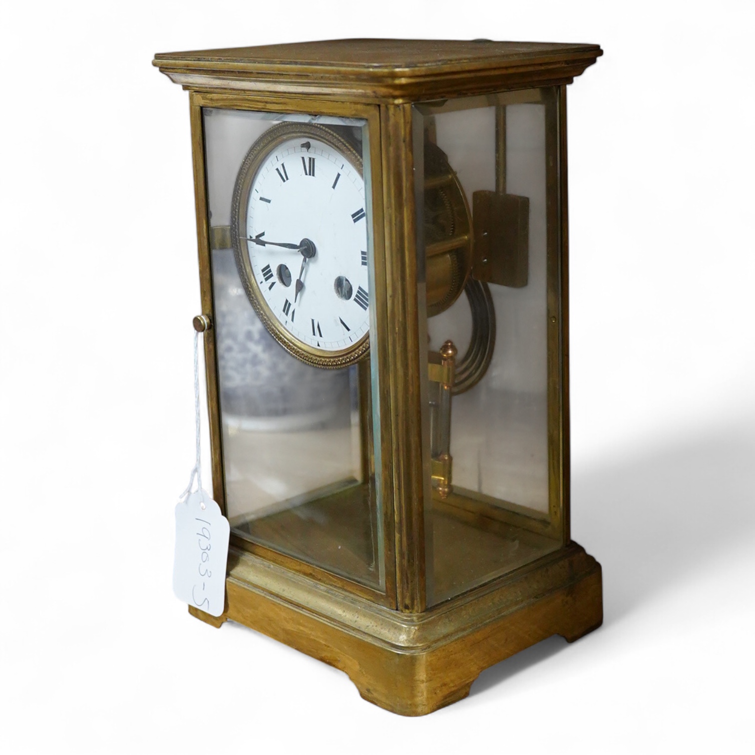 A late 19th century French brass four glass mantel clock, 25.5cm high